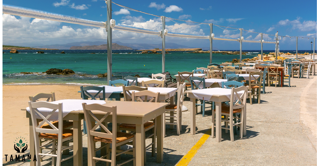 cafe seating on boardwalk overlooking the beach