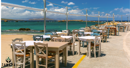 cafe seating on boardwalk overlooking the beach