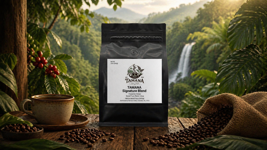 tamana signature blend coffee in a tropical setting on wooden rustic table with waterfall in the background and ripe coffee beans